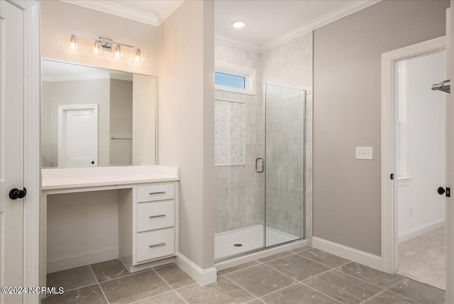 bathroom with ornamental molding, a shower with door, and vanity