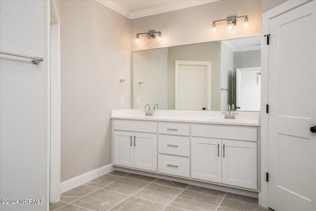 bathroom featuring ornamental molding, tile patterned floors, and vanity