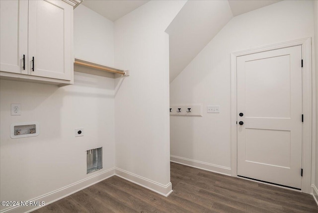 washroom featuring electric dryer hookup, washer hookup, dark wood-type flooring, and cabinets