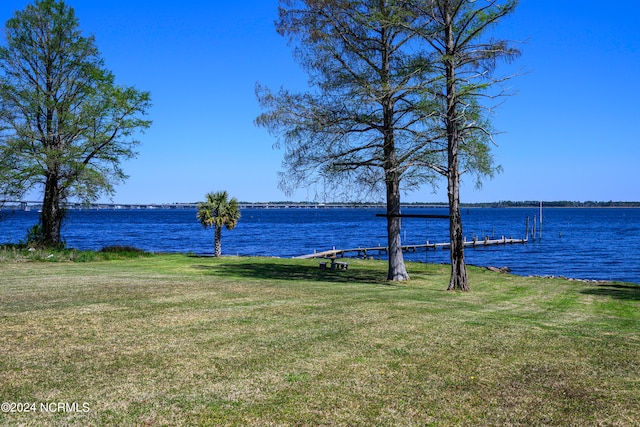 property view of water featuring a boat dock