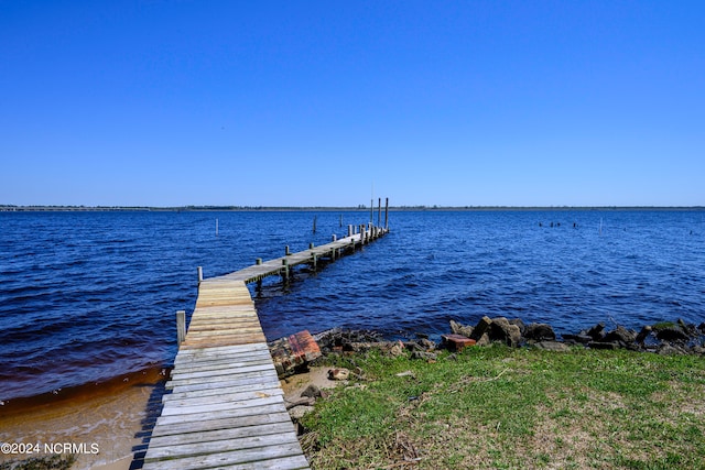 view of dock with a water view