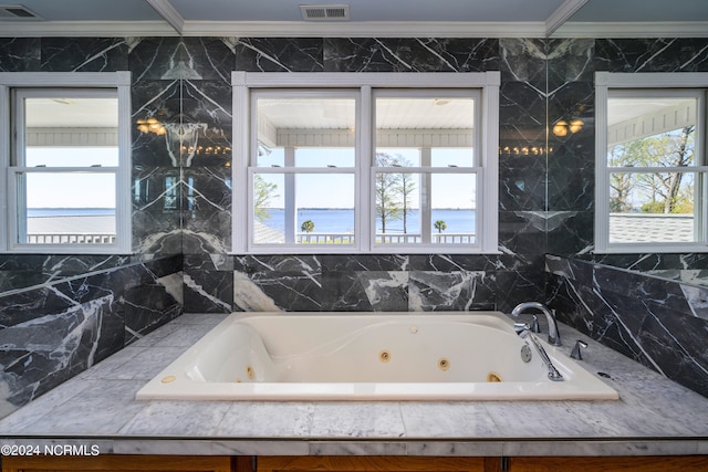 bathroom featuring tile walls and crown molding