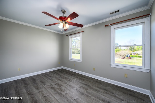 unfurnished room with dark hardwood / wood-style flooring, a healthy amount of sunlight, and ceiling fan