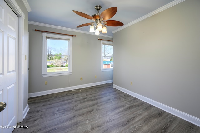 unfurnished room with ceiling fan, dark wood-type flooring, and ornamental molding