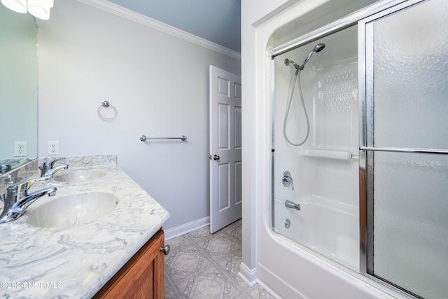 bathroom featuring tile flooring, enclosed tub / shower combo, ornamental molding, and double vanity