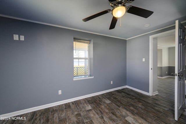 empty room with ceiling fan, ornamental molding, and dark hardwood / wood-style floors