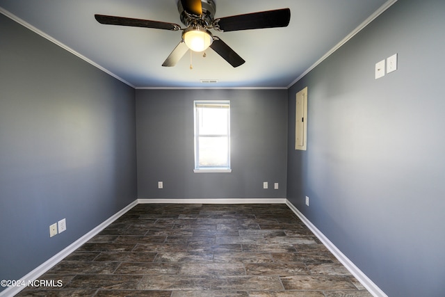 spare room with ceiling fan and crown molding