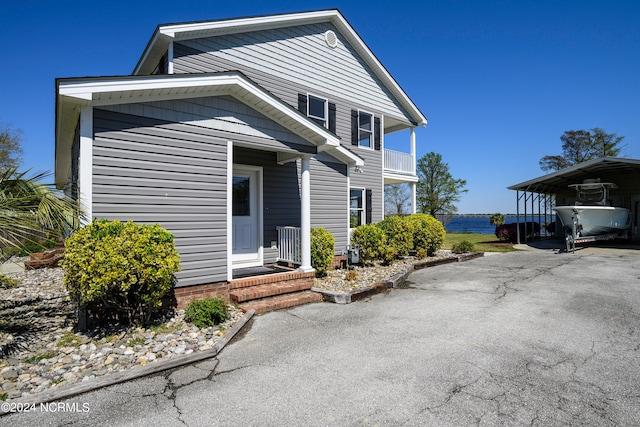 view of front of house featuring a carport