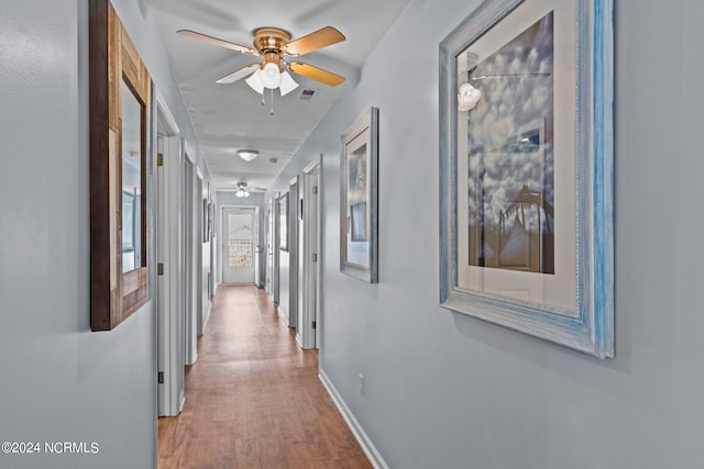 corridor featuring light hardwood / wood-style flooring