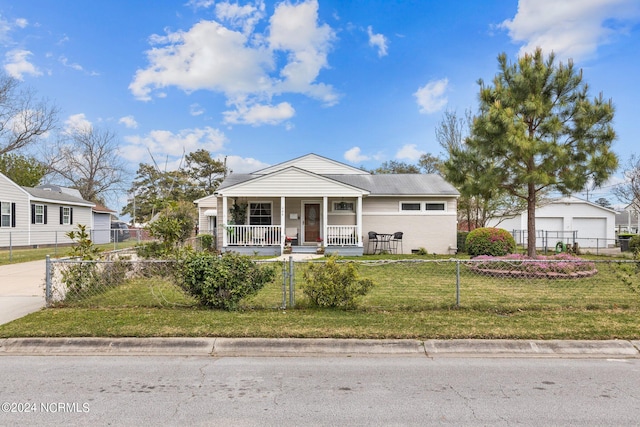 view of front of property with a porch and a front yard