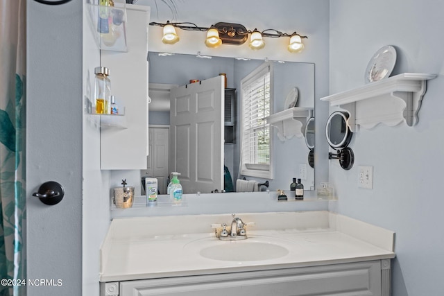 bathroom featuring oversized vanity