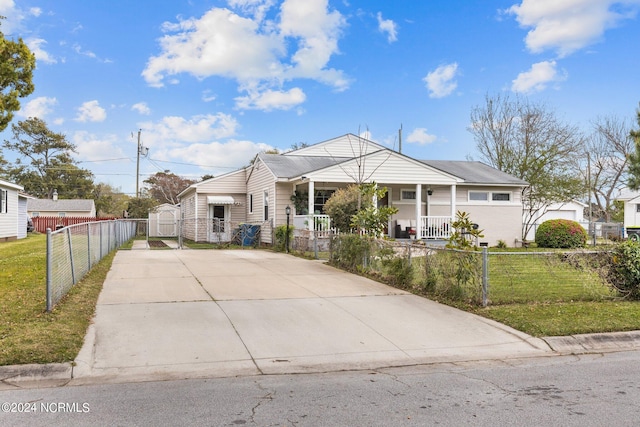 view of front of property with a porch and a front lawn