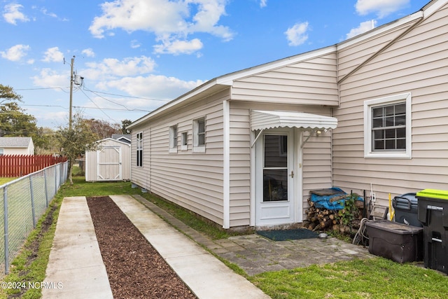 exterior space featuring a storage shed