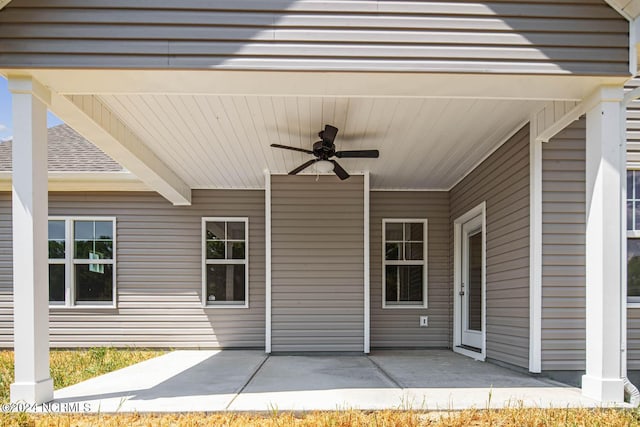 view of patio featuring ceiling fan