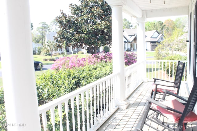 balcony featuring a porch