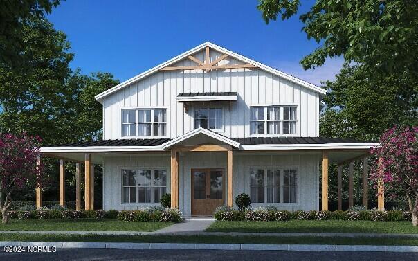 modern farmhouse style home featuring board and batten siding