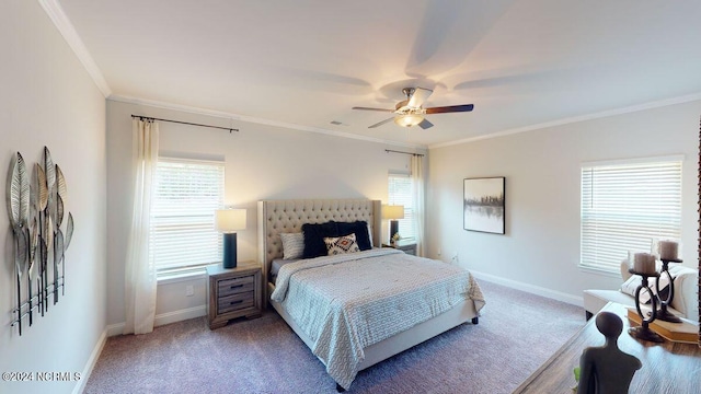 carpeted bedroom featuring ornamental molding and ceiling fan