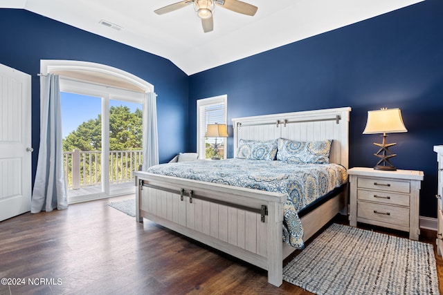 bedroom featuring ceiling fan, dark hardwood / wood-style floors, access to exterior, and lofted ceiling