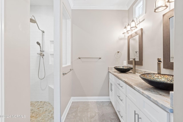 bathroom featuring crown molding, dual bowl vanity, and tile flooring