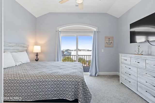 carpeted bedroom with vaulted ceiling, ceiling fan, and access to exterior