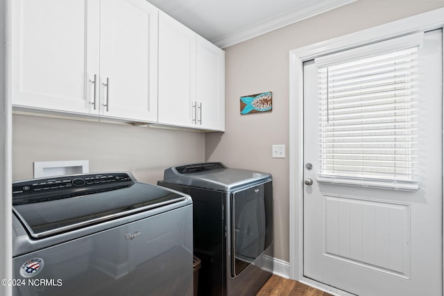 laundry room with cabinets, washer and clothes dryer, hardwood / wood-style floors, crown molding, and washer hookup