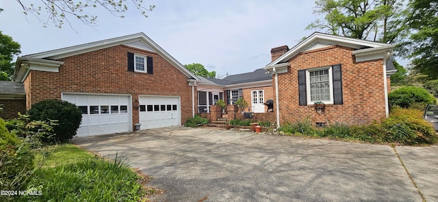 front facade with a garage