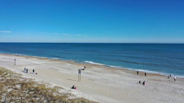 view of water feature with a beach view