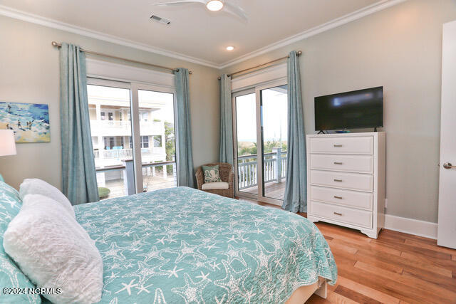 bedroom featuring ornamental molding, ceiling fan, access to exterior, and light hardwood / wood-style flooring