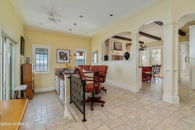 tiled dining space with ceiling fan, decorative columns, and ornamental molding