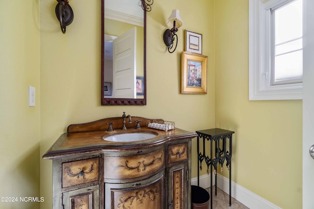 bathroom with vanity and tile floors