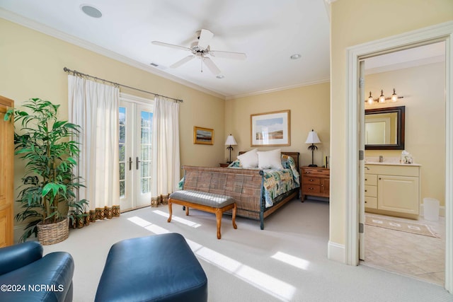 carpeted bedroom with ceiling fan, crown molding, ensuite bathroom, and french doors