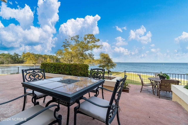 view of patio / terrace featuring a water view