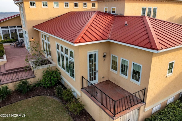 rear view of house with a patio