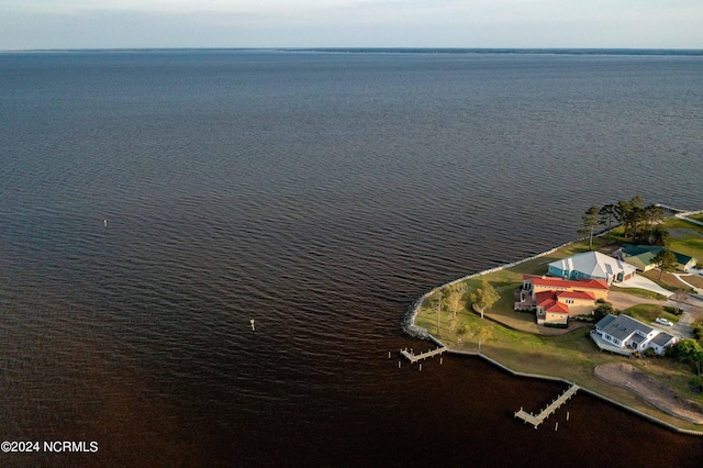 exterior space with a water view