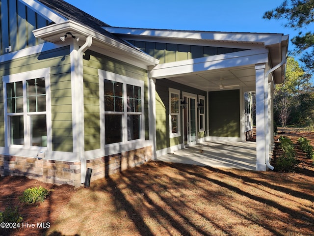 doorway to property with a patio