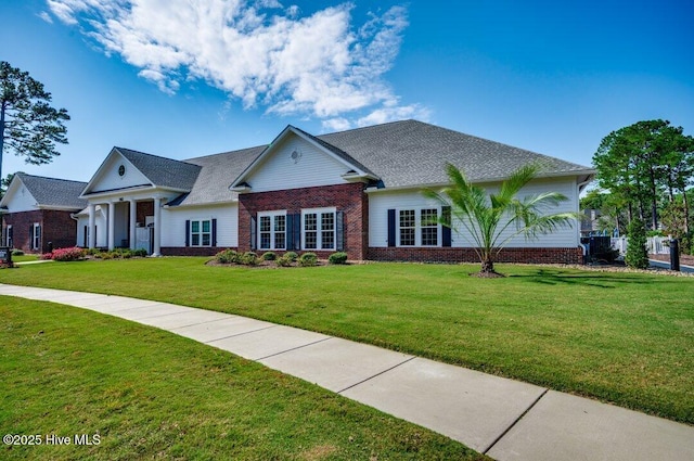 view of front of home with a front yard