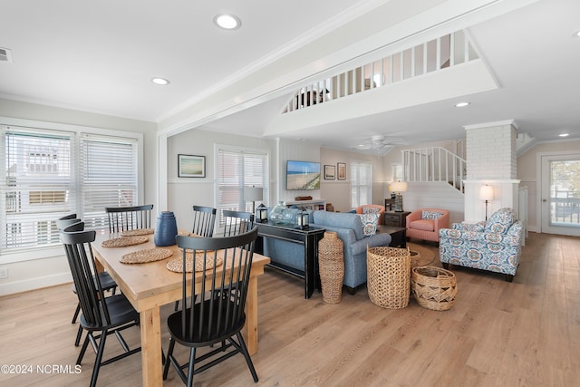 dining space with stairway, light wood-style flooring, ornamental molding, and recessed lighting