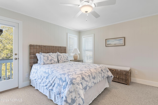 bedroom featuring access to outside, ornamental molding, ceiling fan, and carpet flooring