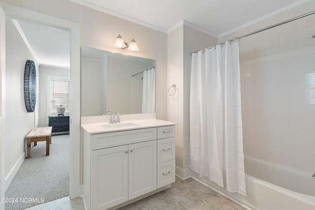 bathroom with shower / tub combo, ornamental molding, and vanity