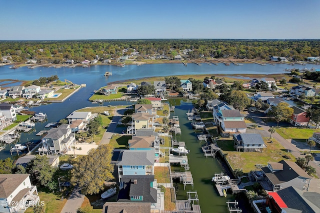 birds eye view of property featuring a water view and a residential view