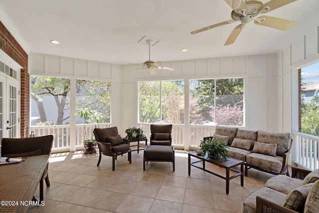 sunroom / solarium with ceiling fan