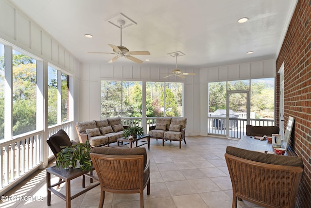 sunroom / solarium with ceiling fan