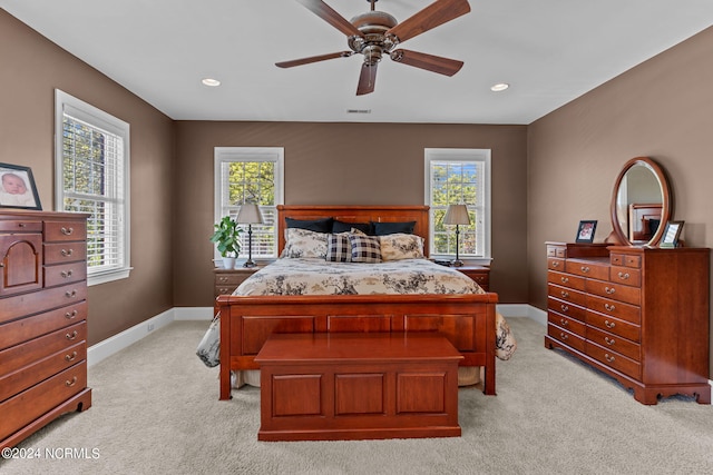 carpeted bedroom featuring ceiling fan