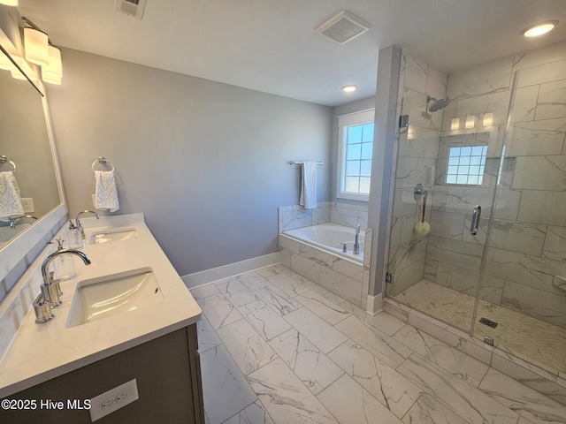 full bathroom featuring a sink, visible vents, a garden tub, and marble finish floor