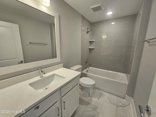 bathroom featuring vanity, washtub / shower combination, visible vents, toilet, and marble finish floor