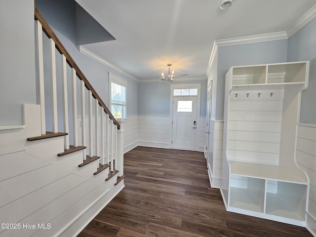 mudroom featuring ornamental molding, dark hardwood / wood-style floors, and a notable chandelier