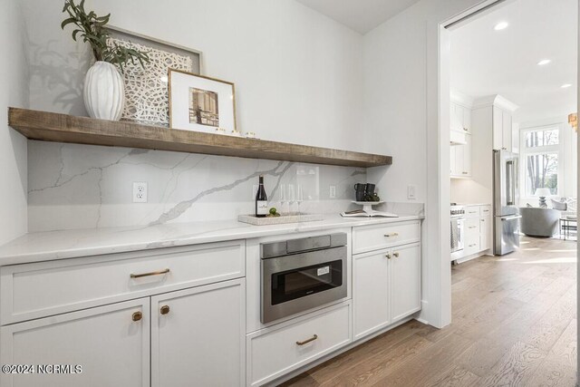 kitchen featuring hanging light fixtures, sink, and plenty of natural light