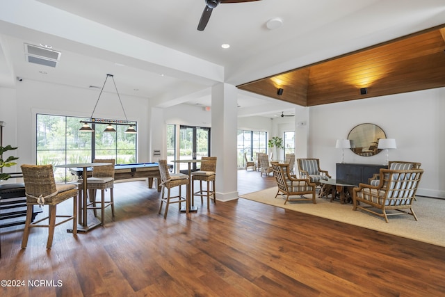 interior space with dark hardwood / wood-style floors and ceiling fan