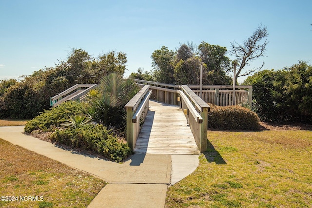 view of community featuring a yard