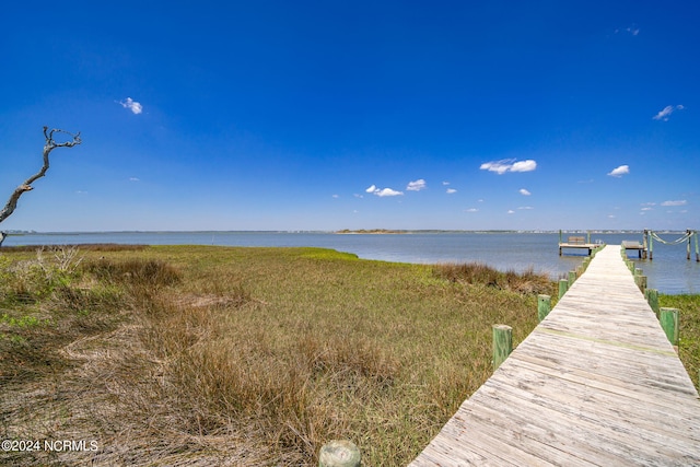 view of dock with a water view